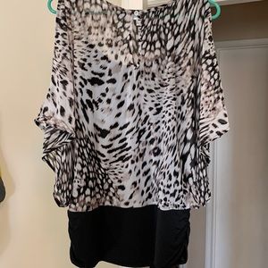 Jennifer Lopez cutout shoulder shirt